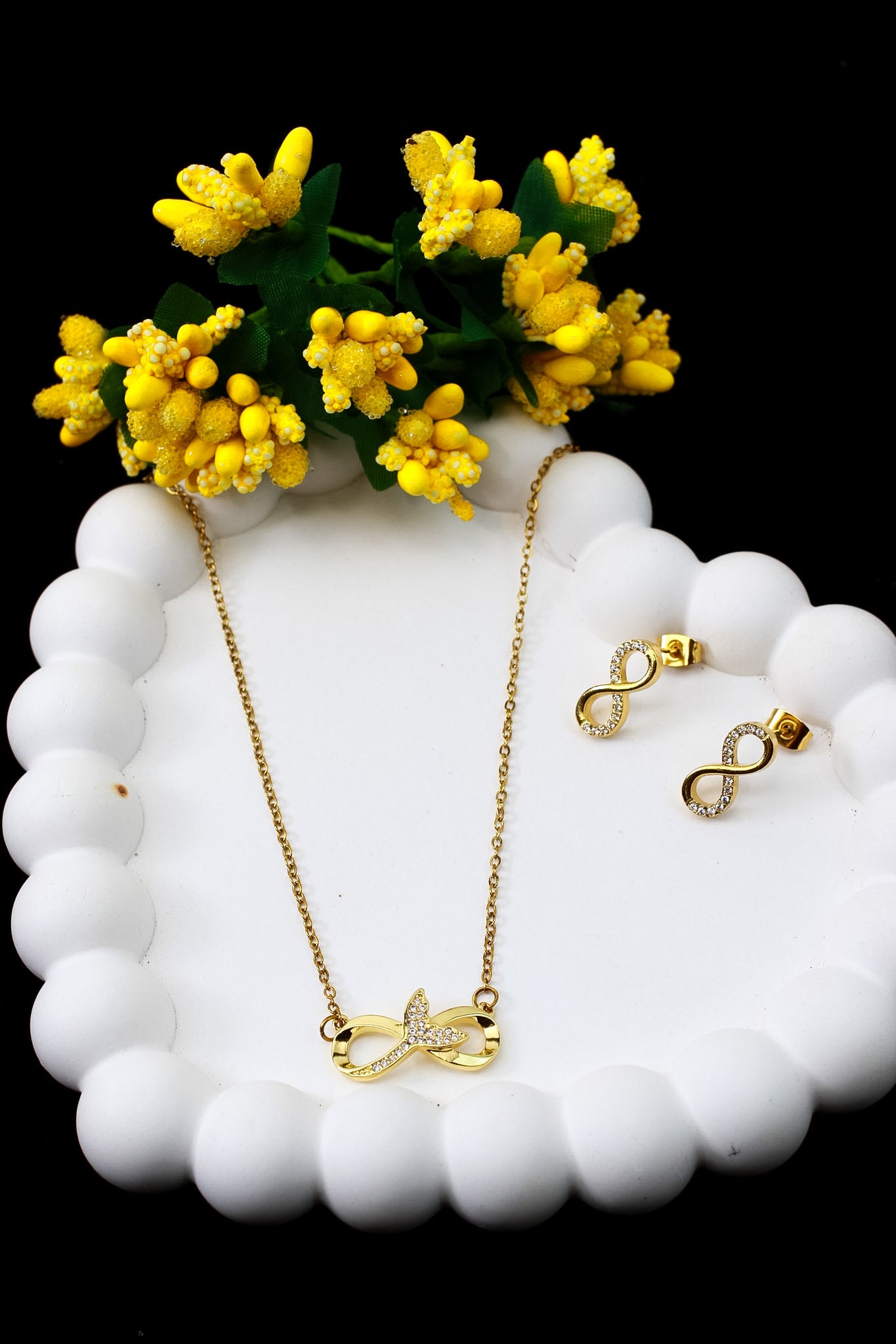 Infinity pendant necklace and matching zircon earrings set, 18K gold plated – full length view