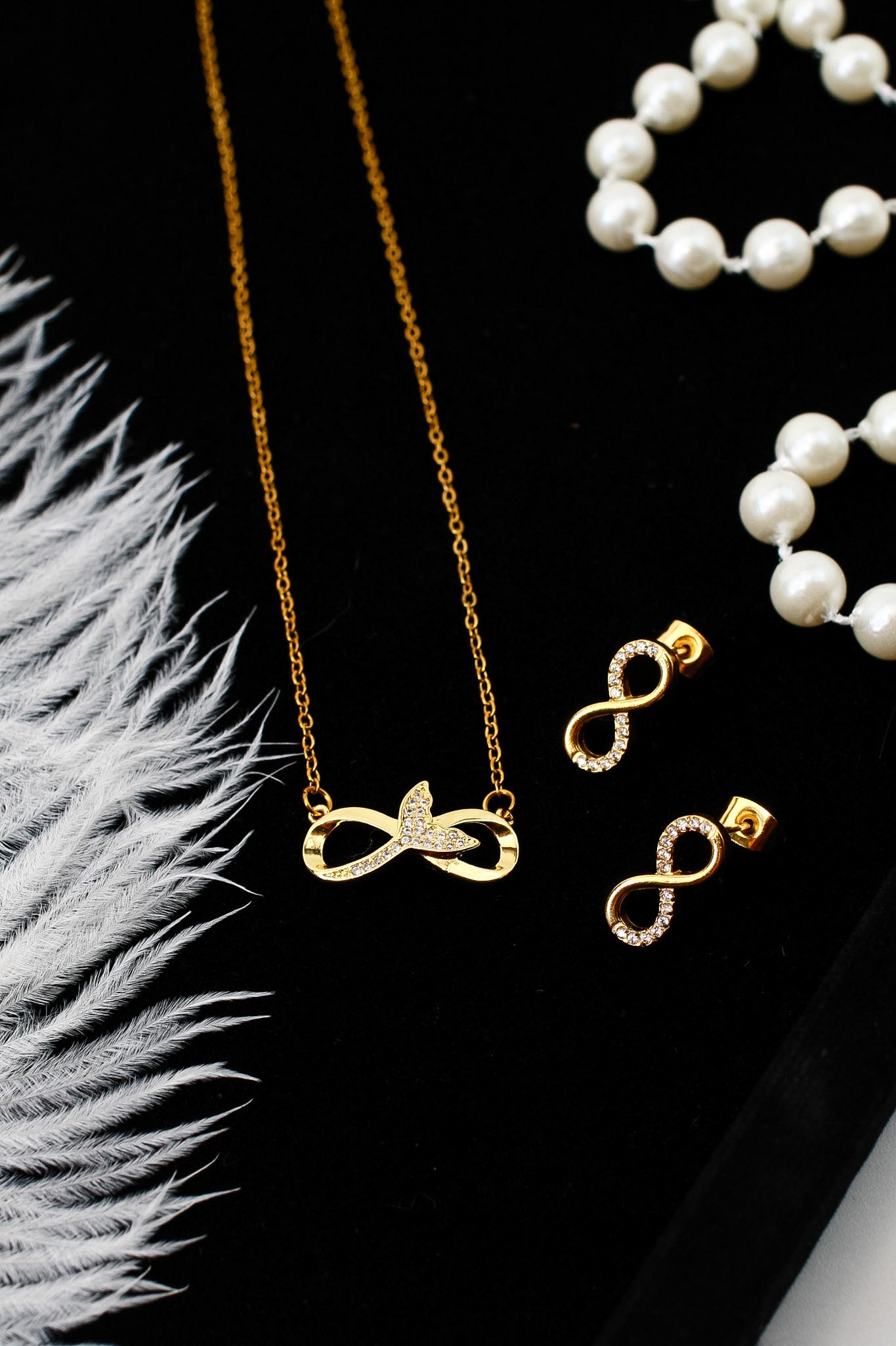 Infinity pendant necklace and matching zircon earrings set, 18K gold plated – additional angle