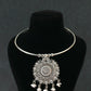 Oxidised German Silver Hansli Necklace with Ornate Floral Disc Pendant