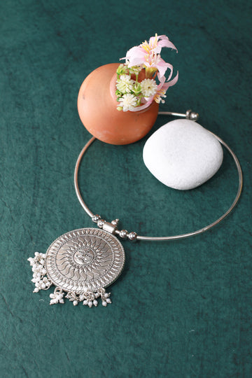 Oxidised German Silver Hansli Necklace with Sun Disc Pendant