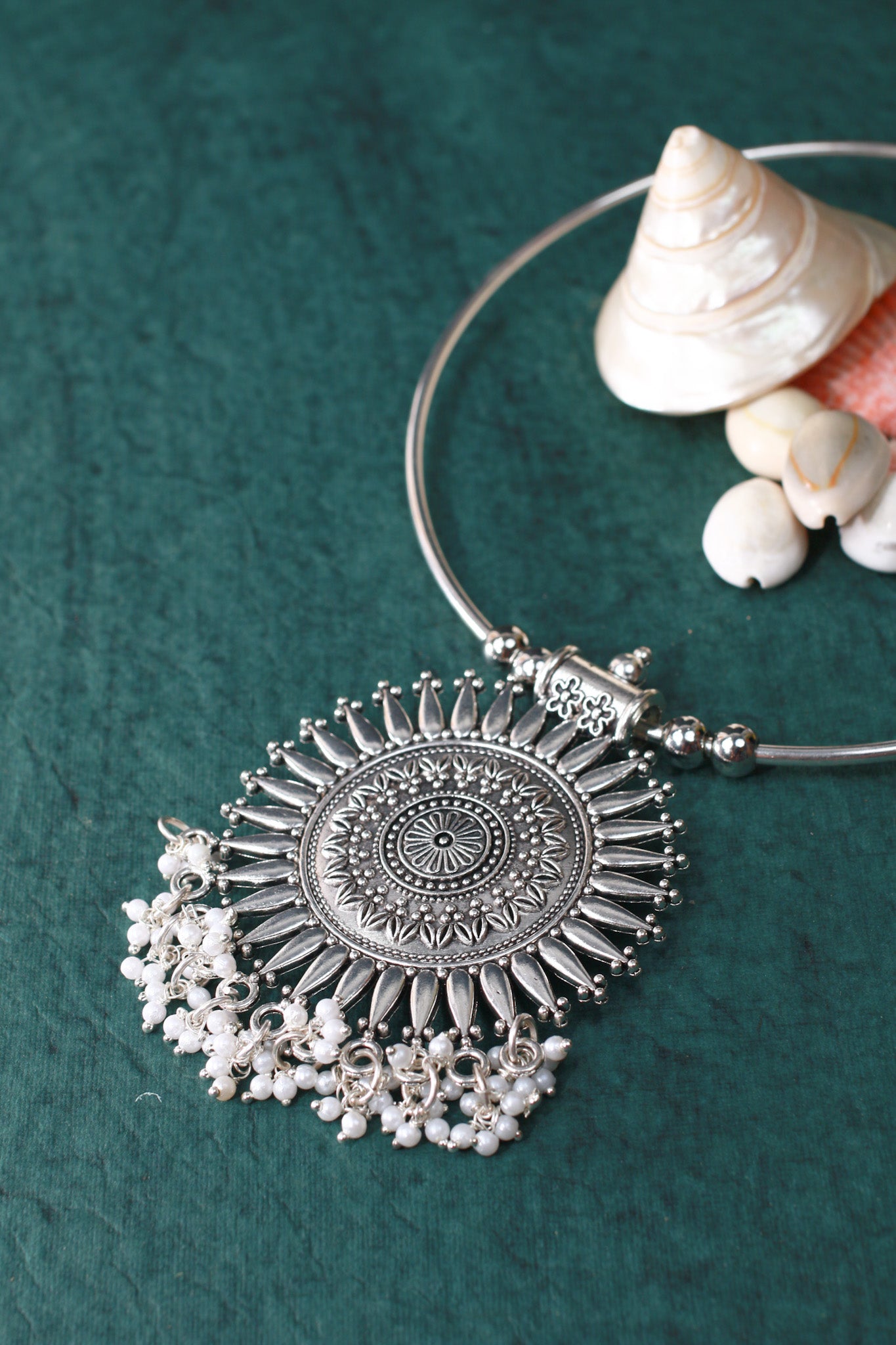 Oxidised German Silver Hansli Necklace with Sunburst Pendant