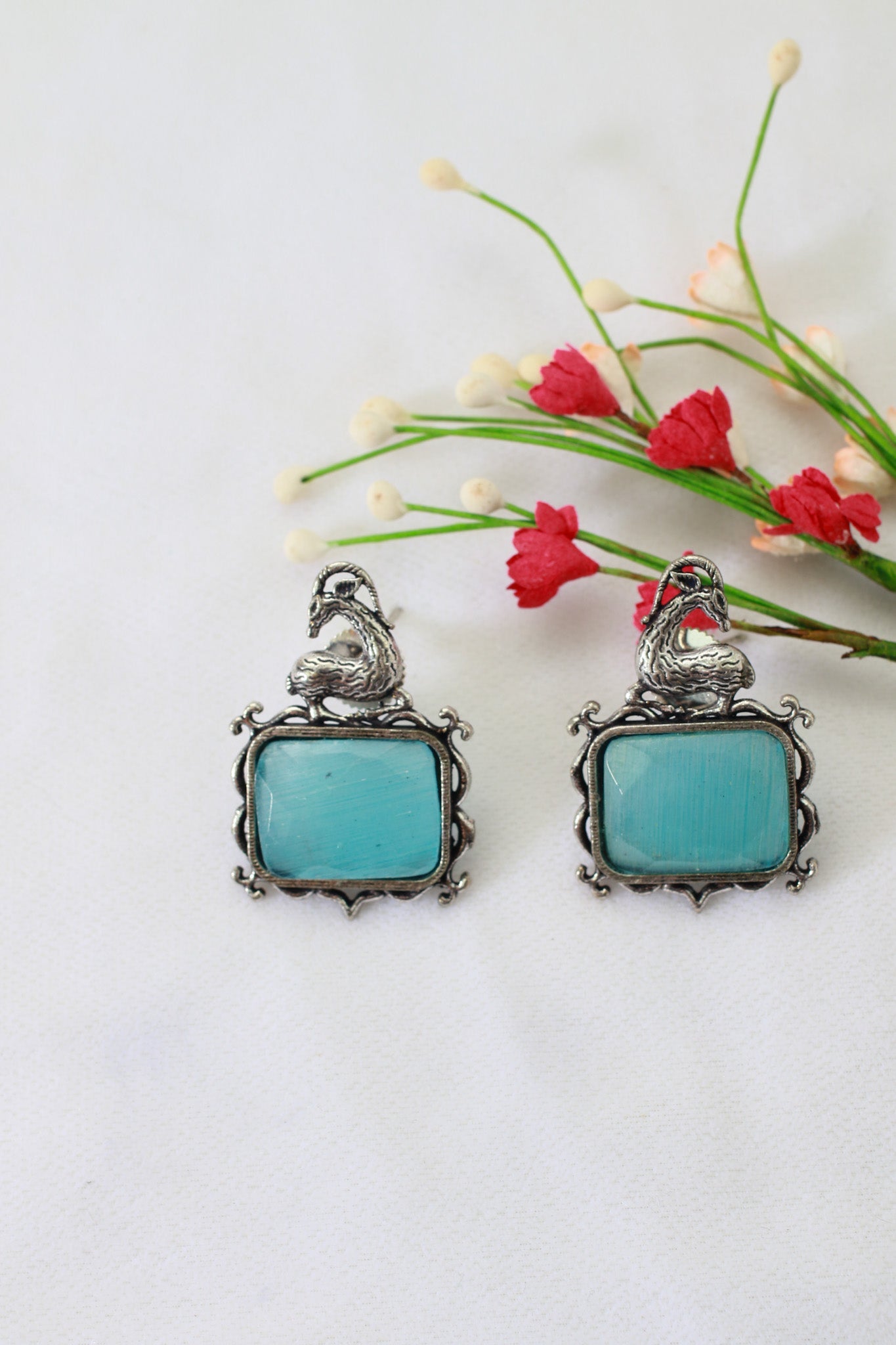 Blue Monalisa Rectangle Oxidised German Silver Earrings with Deer Motif - Maxiblink