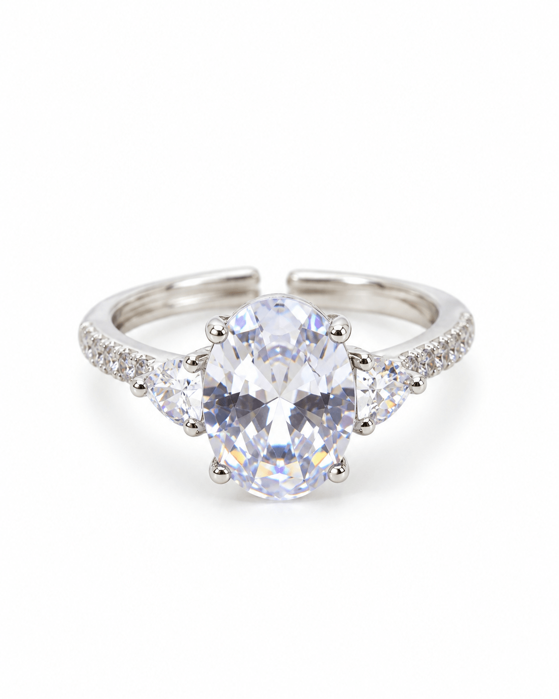 Clear Oval Three-Stone Ring with Heart Side Stones - Maxiblink