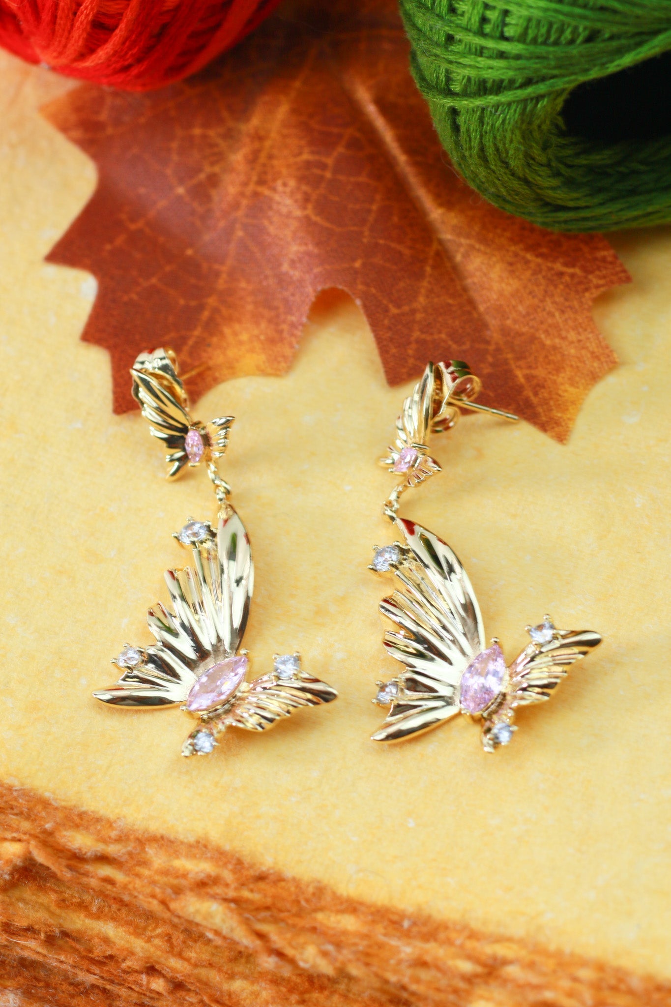Gold Butterfly Drop Earrings with Pink Crystal - Maxiblink