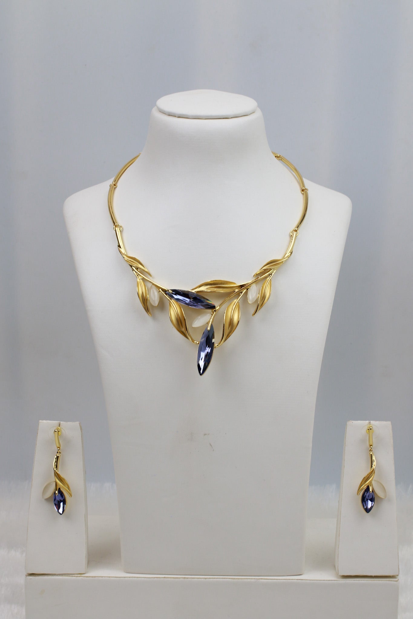 Gold Plated Leaf Motif Necklace Set with Blue Marquise AD Stones | Anti‑Tarnish - Maxiblink