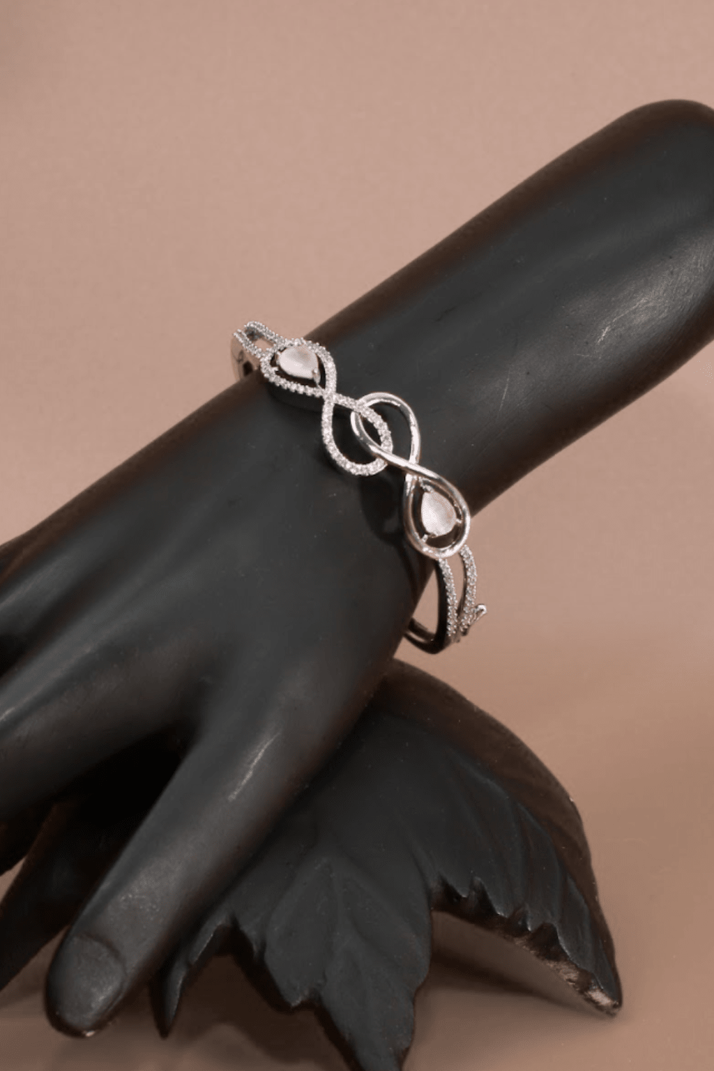 Infinity Curve Silver Bracelet with Soft Pink Stones - Maxiblink