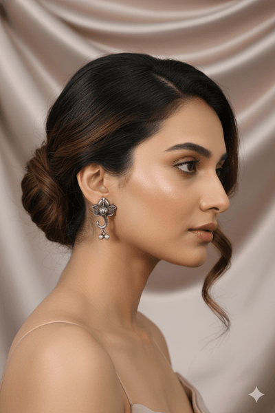Oxidised German Silver Lotus Stud Earrings with Ghungroo Drops - Maxiblink