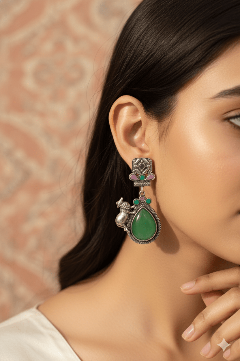 Temple Cow Motif Teardrop Earrings with Green Monalisa | Oxidised German Silver - Maxiblink