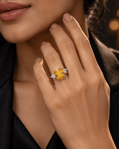 Yellow Cushion-Cut Three-Stone Ring with Heart Accents - Maxiblink